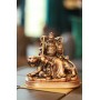 Статуэтка "Цай-Шень на тигре" на подставке (золотистая) привлекает в жизнь своего владельца богатство и процветание!